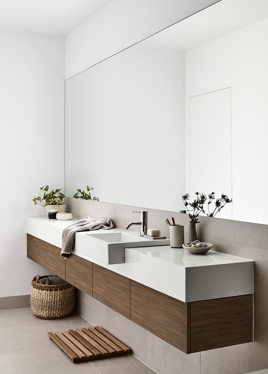 Floating vanity in a natural style bathroom